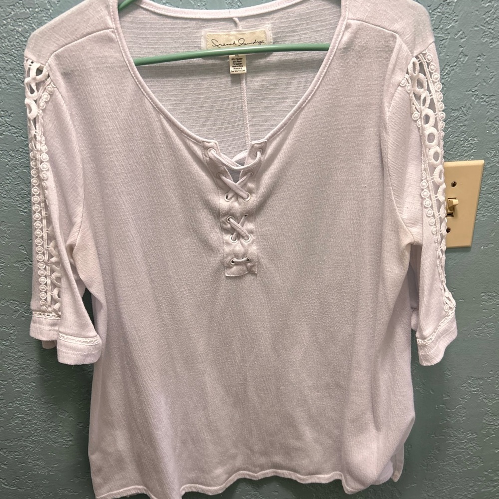 White top with braided sleeves. Nice for Spring & Summer.